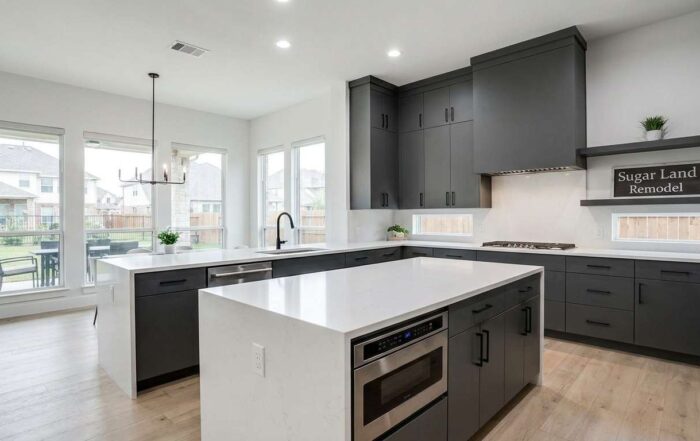 flat panel kitchen cabinets dark grey modern finish Sugar Land remodel